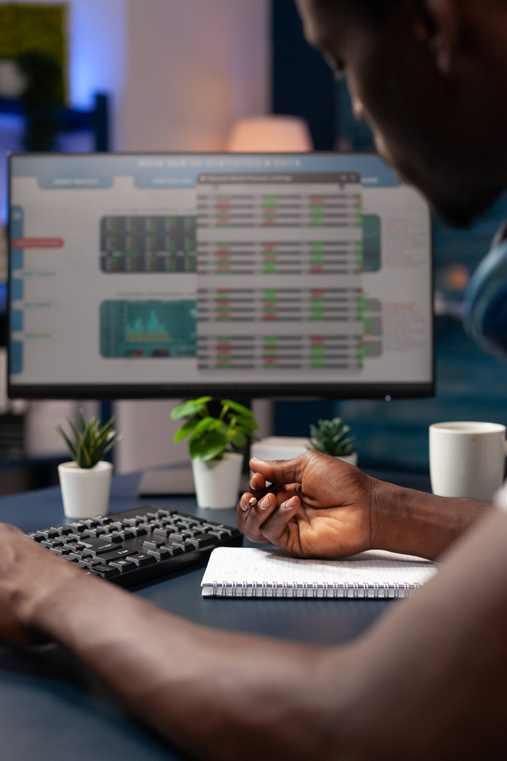 why-choose-us-02 Close Up Entrepreneur Analyzing Numbers Stock Market Trade Writing Global Profit Notebook Living Room Freelancer Man Working Remote From Home Thinking Invest Crypto Currency Scaled