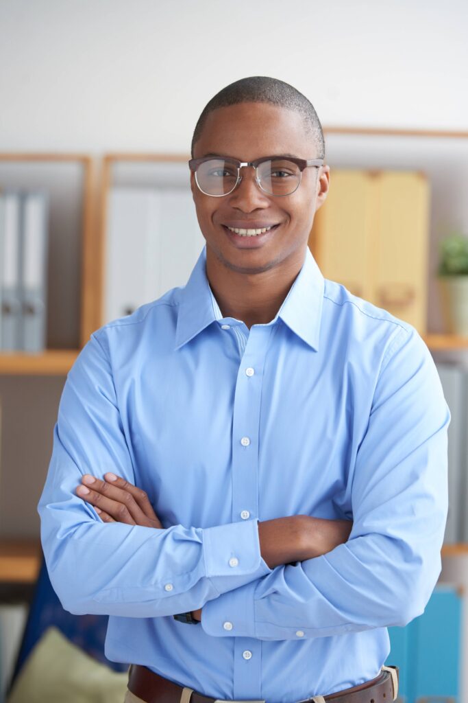 confident entrepreneur looking camera with arms folded smiling (1)